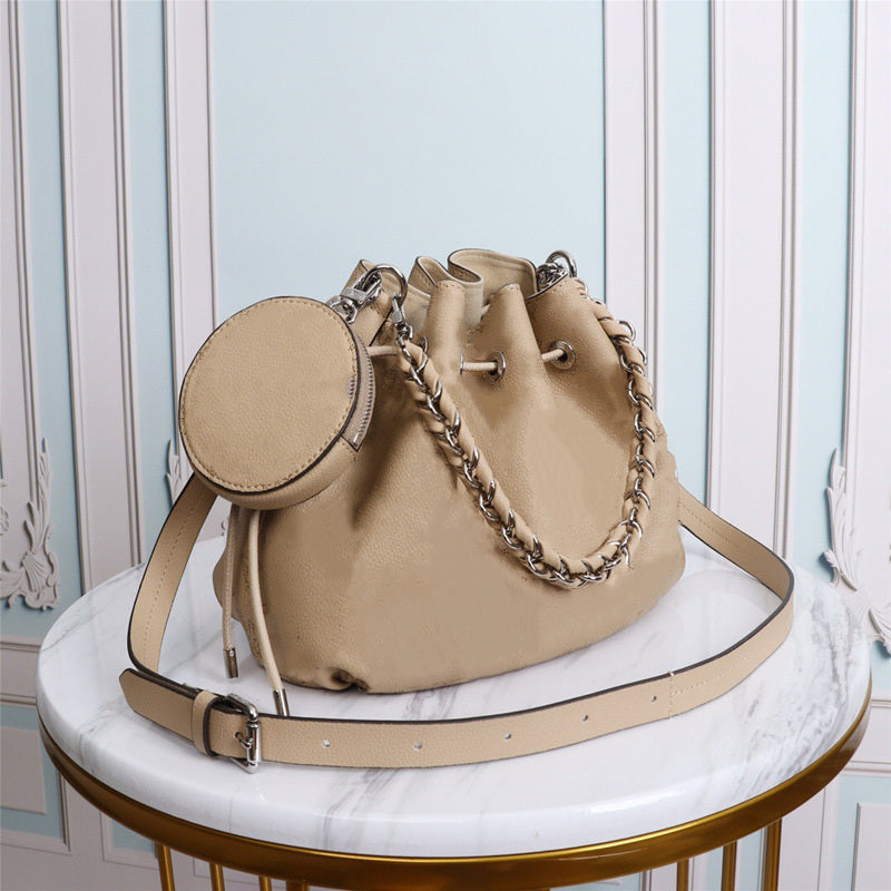 2021Perforated personalized design women&#039;s bucket bag soft classic suit handbag leather woven handle + long leather shoulder bags 25*25*20cm