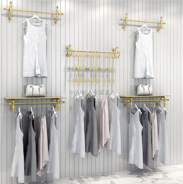 The display rack of clothing store hangs Commercial Furniture children&#039;s cloth hang wall hanging clothes racks mall is shelf swith gold