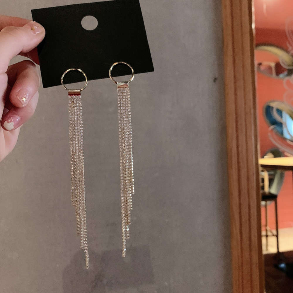 Korean dongdamen temperament net red long water drill claw chain Tassel female S925 silver needle show thin Earrings