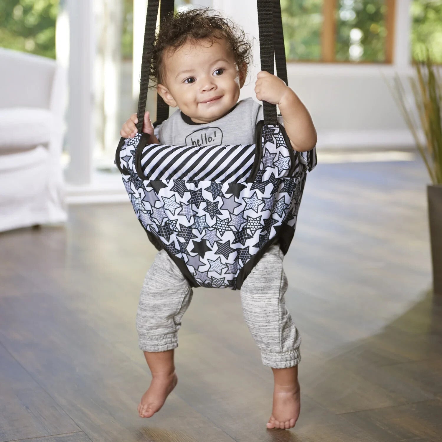 Evenflo Exersaucer Door Jumper - Black and White Stars - Up to 24 Pounds